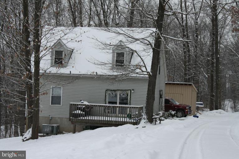 101 Carriage Court High View, WV 26808 - Photo 1 of 22 a view of a house with a snow in the yard