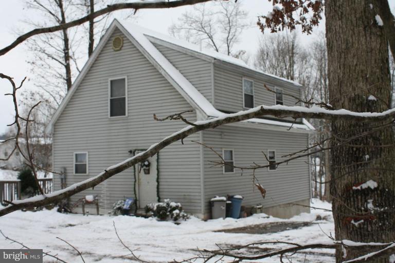 101 Carriage Court High View, WV 26808 - Photo 2 of 22 a house view with a backyard space