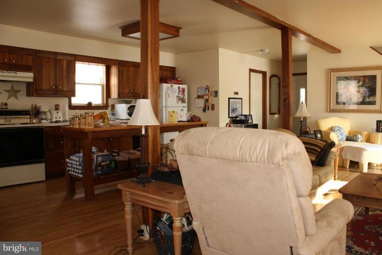 101 Carriage Court High View, WV 26808 - Photo 11 of 22 a living room with furniture a wooden floor and next to a window