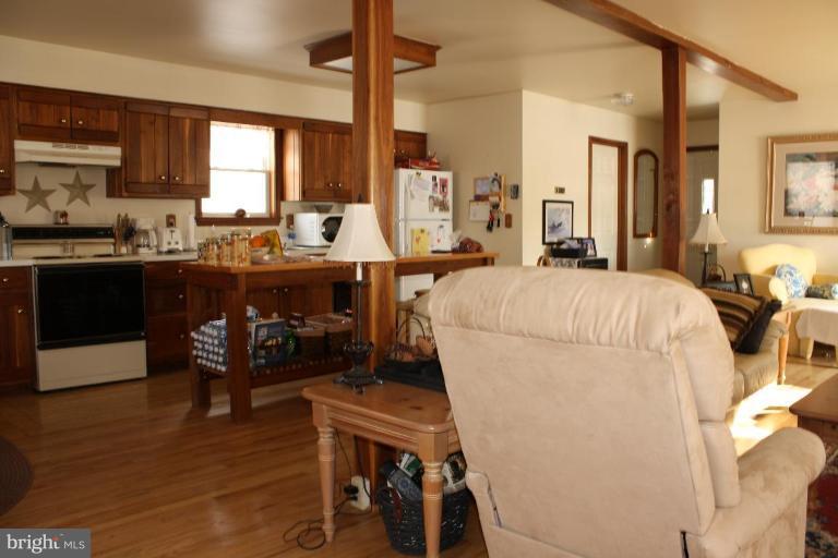 101 Carriage Court High View, WV 26808 - Photo 12 of 22 a bed room with a bed furniture and a kitchen view