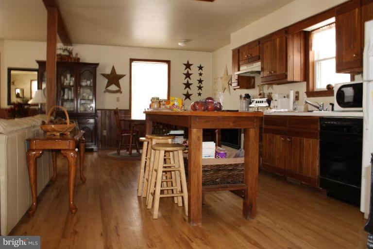 101 Carriage Court High View, WV 26808 - Photo 16 of 22 a kitchen with a sink cabinets and wooden floor