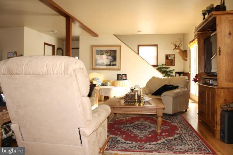 101 Carriage Court High View, WV 26808 - Photo 10 of 22 a living room with furniture and a rug