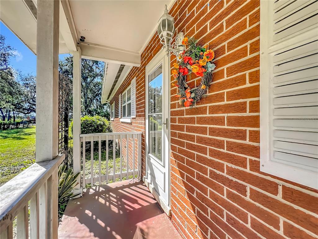 7802 Mizell Street Coleman, FL 34785 - Photo 2 of 44 a view of outdoor space with garden