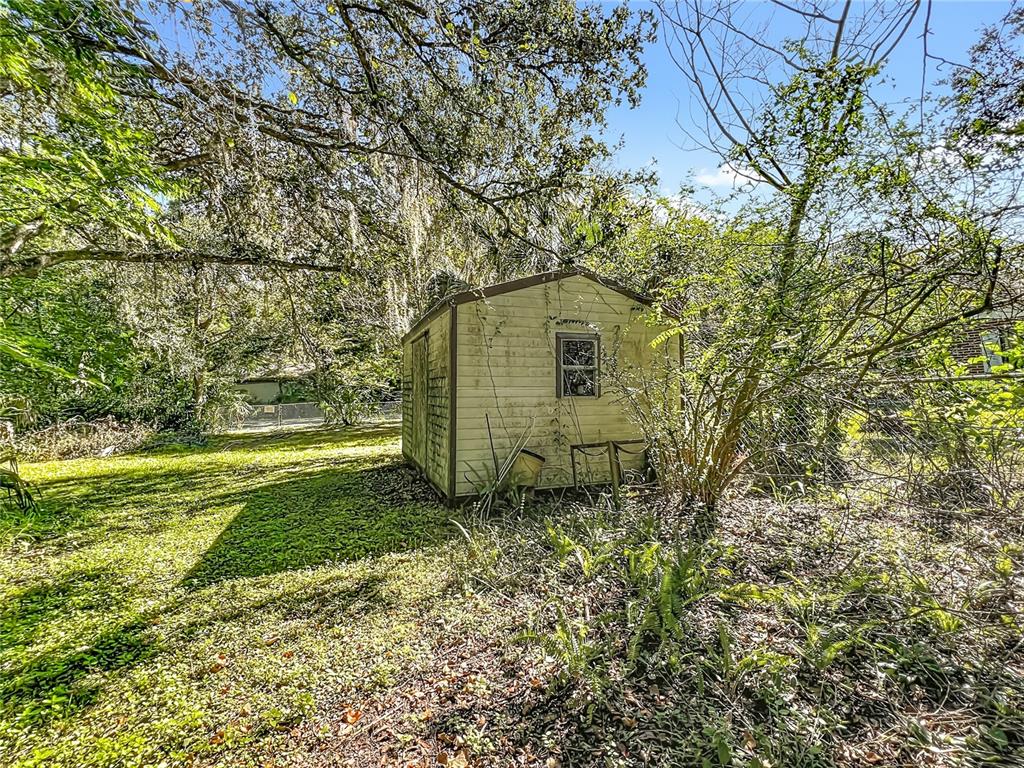 7802 Mizell Street Coleman, FL 34785 - Photo 30 of 44 a view of a backyard
