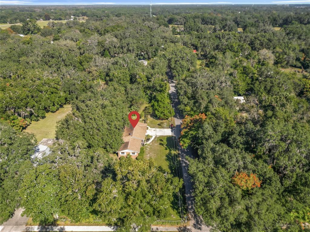 7802 Mizell Street Coleman, FL 34785 - Photo 34 of 44 an aerial view of a house with a yard