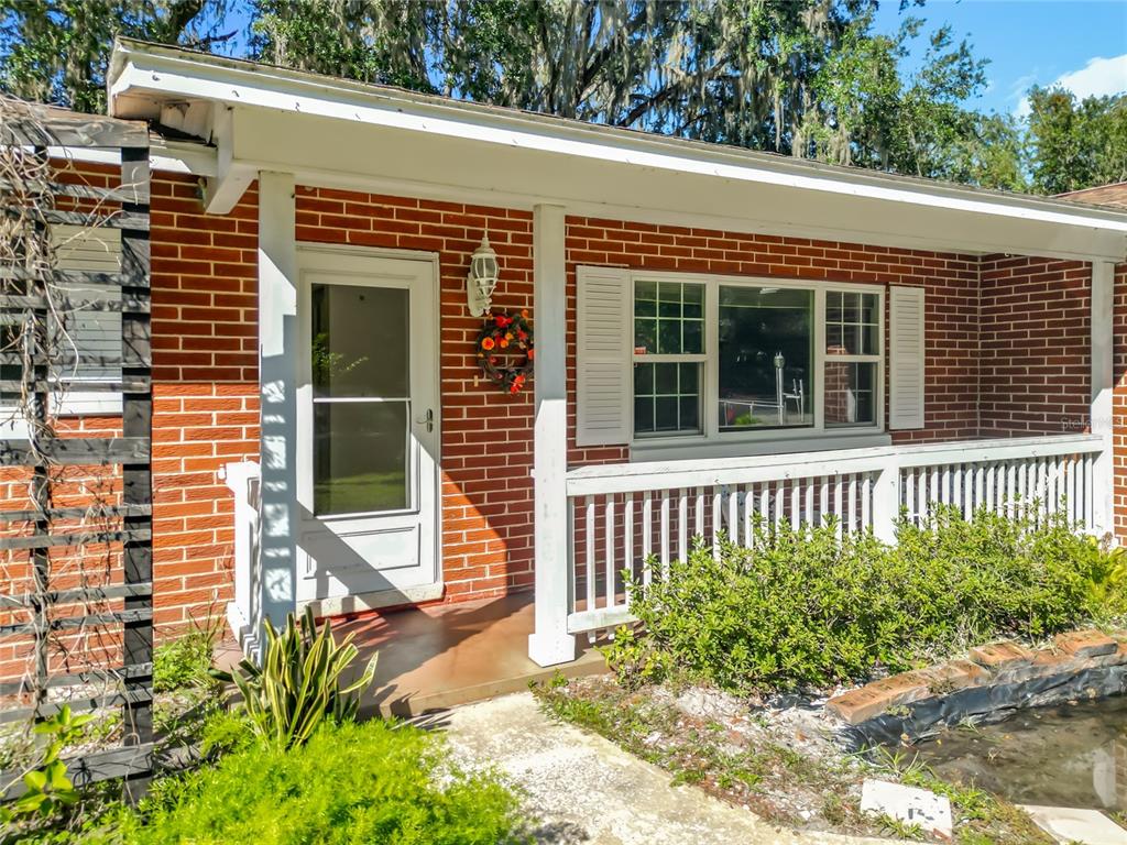 7802 Mizell Street Coleman, FL 34785 - Photo 6 of 44 front view of a house