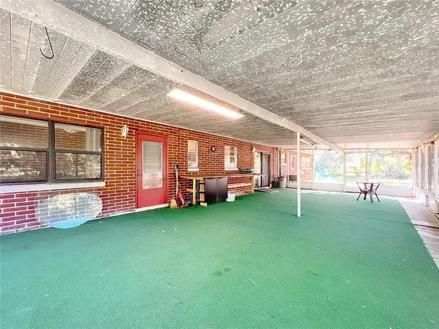 a view of yard with swimming pool and porch