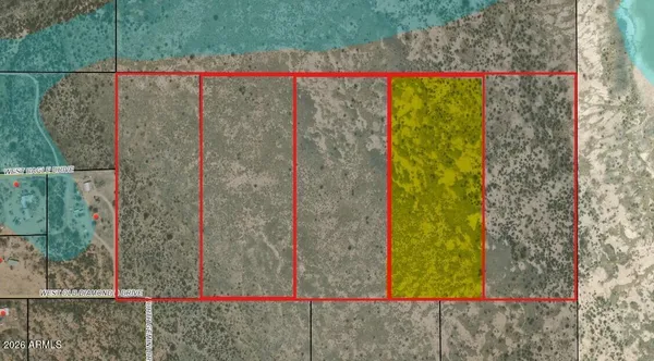 a view of a wooden fence