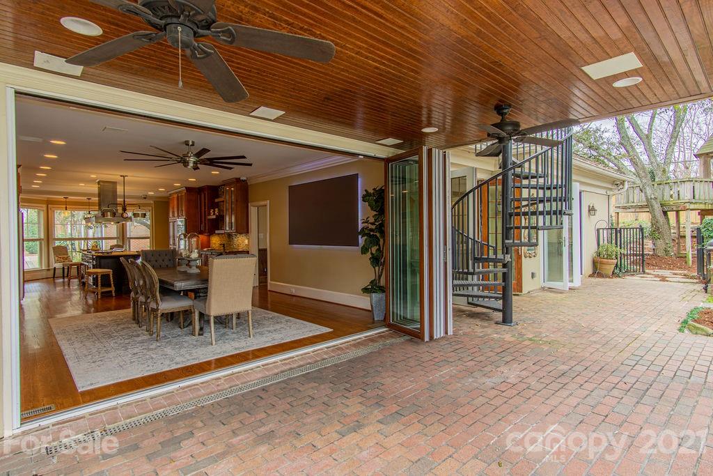 2132 Rolston Drive Charlotte, NC 28207 - Photo 15 of 48 a view of a patio with table and chairs