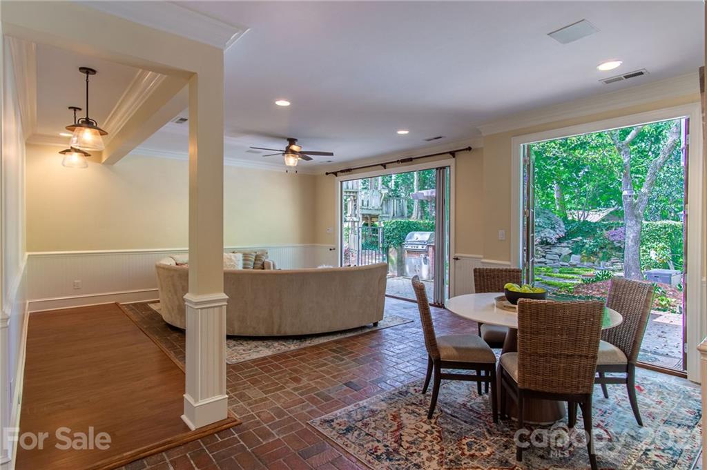 2132 Rolston Drive Charlotte, NC 28207 - Photo 19 of 48 a living room with furniture and a large window