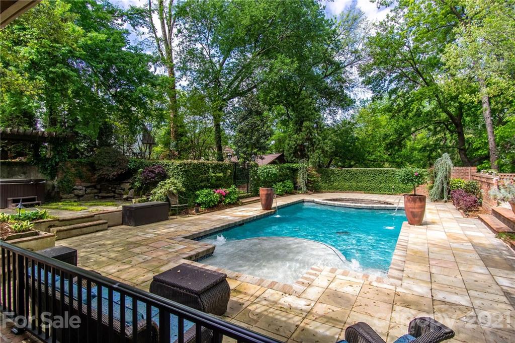 2132 Rolston Drive Charlotte, NC 28207 - Photo 24 of 48 a view of a backyard patio and swimming pool