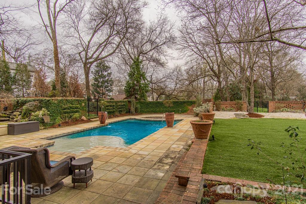 2132 Rolston Drive Charlotte, NC 28207 - Photo 36 of 48 a view of a garden with lawn chairs