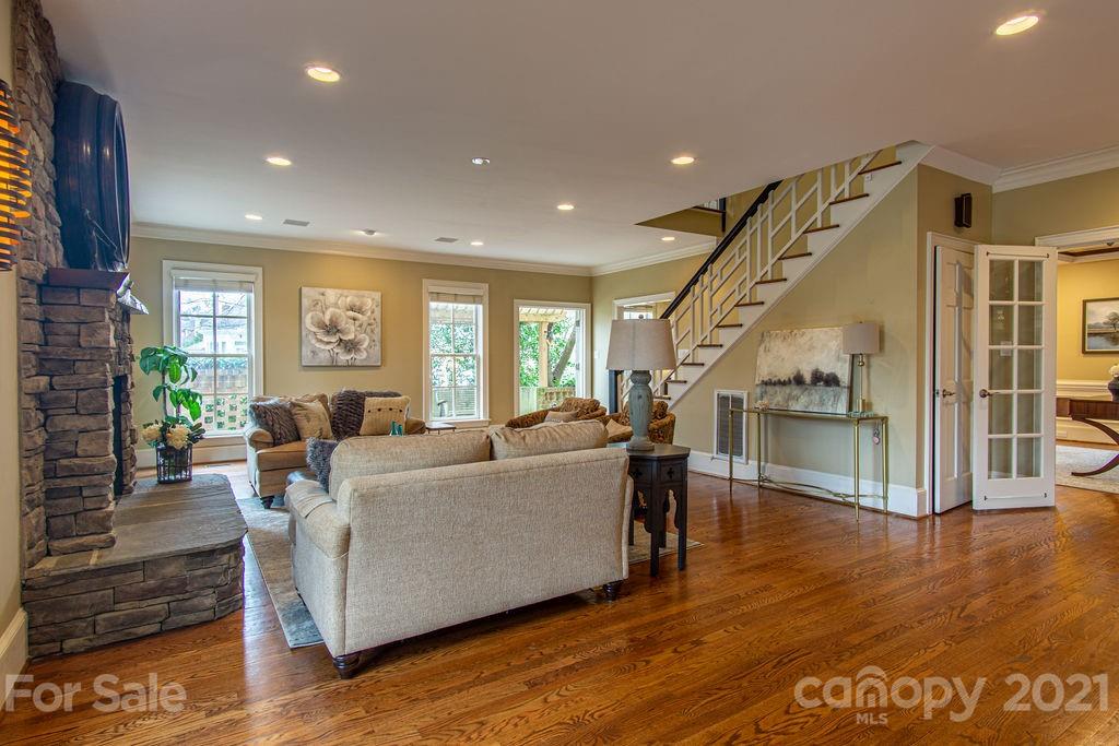 2132 Rolston Drive Charlotte, NC 28207 - Photo 8 of 48 a living room with furniture and a wooden floor