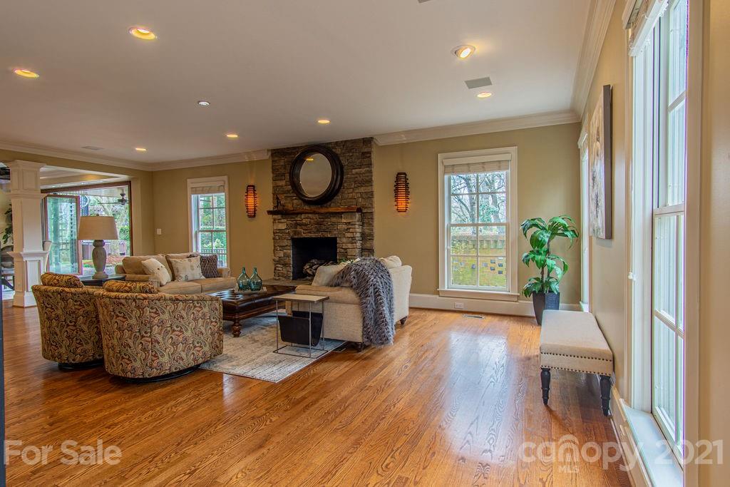 2132 Rolston Drive Charlotte, NC 28207 - Photo 9 of 48 a living room with furniture and a fireplace