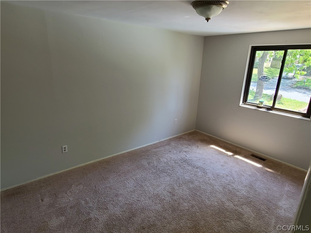 9326 Emmett Road Glen Allen, VA 23060 - Photo 14 of 29 an empty room with a window