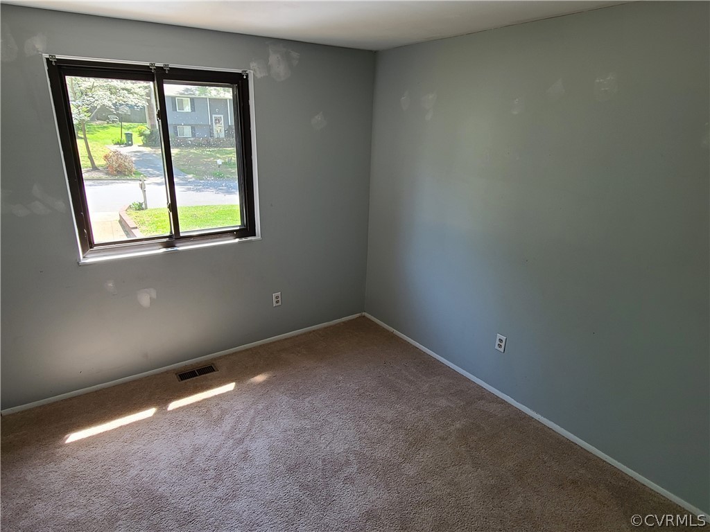9326 Emmett Road Glen Allen, VA 23060 - Photo 16 of 29 an empty room with a window