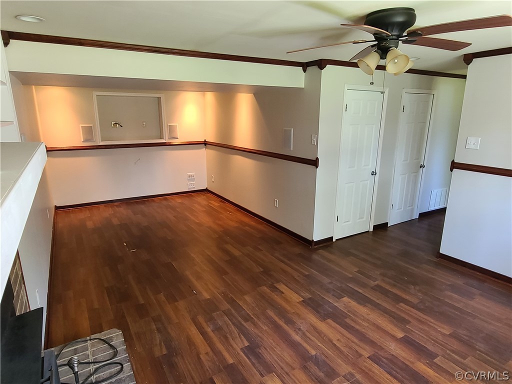9326 Emmett Road Glen Allen, VA 23060 - Photo 22 of 29 a view of a room with wooden floor and a ceiling fan