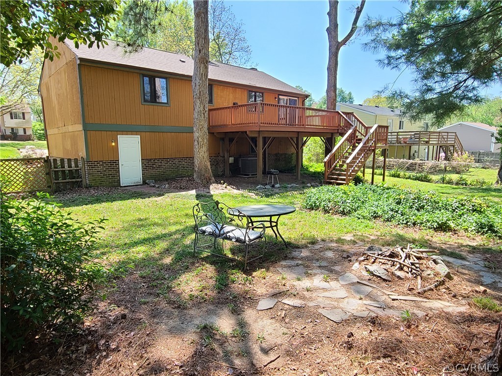 9326 Emmett Road Glen Allen, VA 23060 - Photo 25 of 29 a view of a house with backyard and a tree