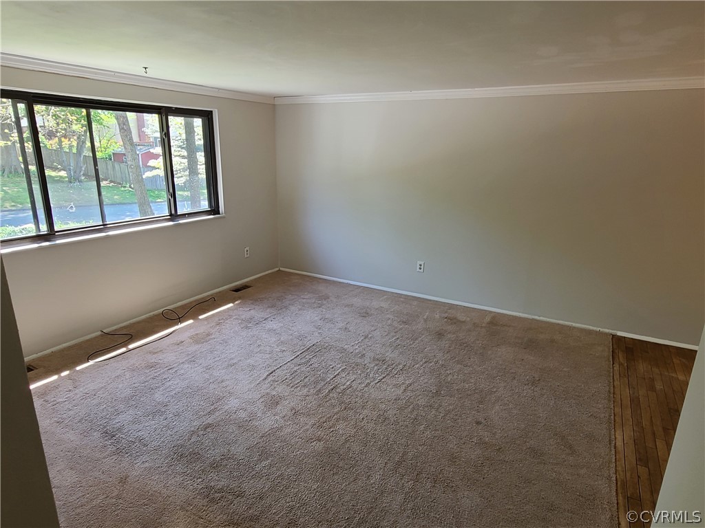 9326 Emmett Road Glen Allen, VA 23060 - Photo 4 of 29 an empty room with a window