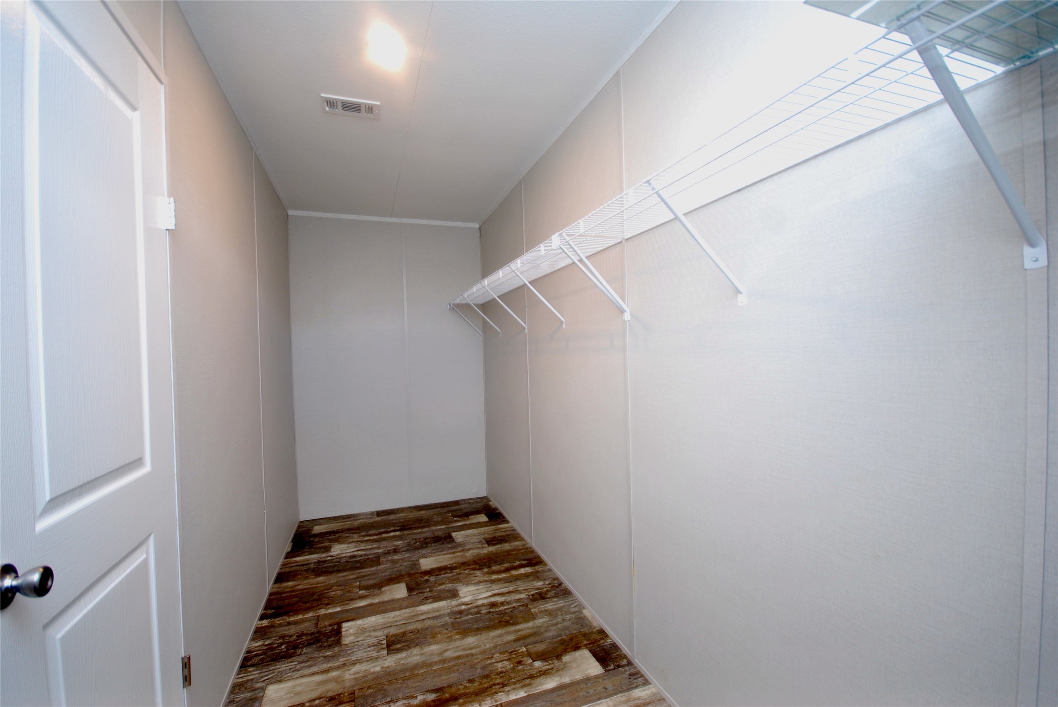 1727 Davis Road West Point, TX 78963 - Photo 16 of 40 a view of a room with stairs and wooden floor