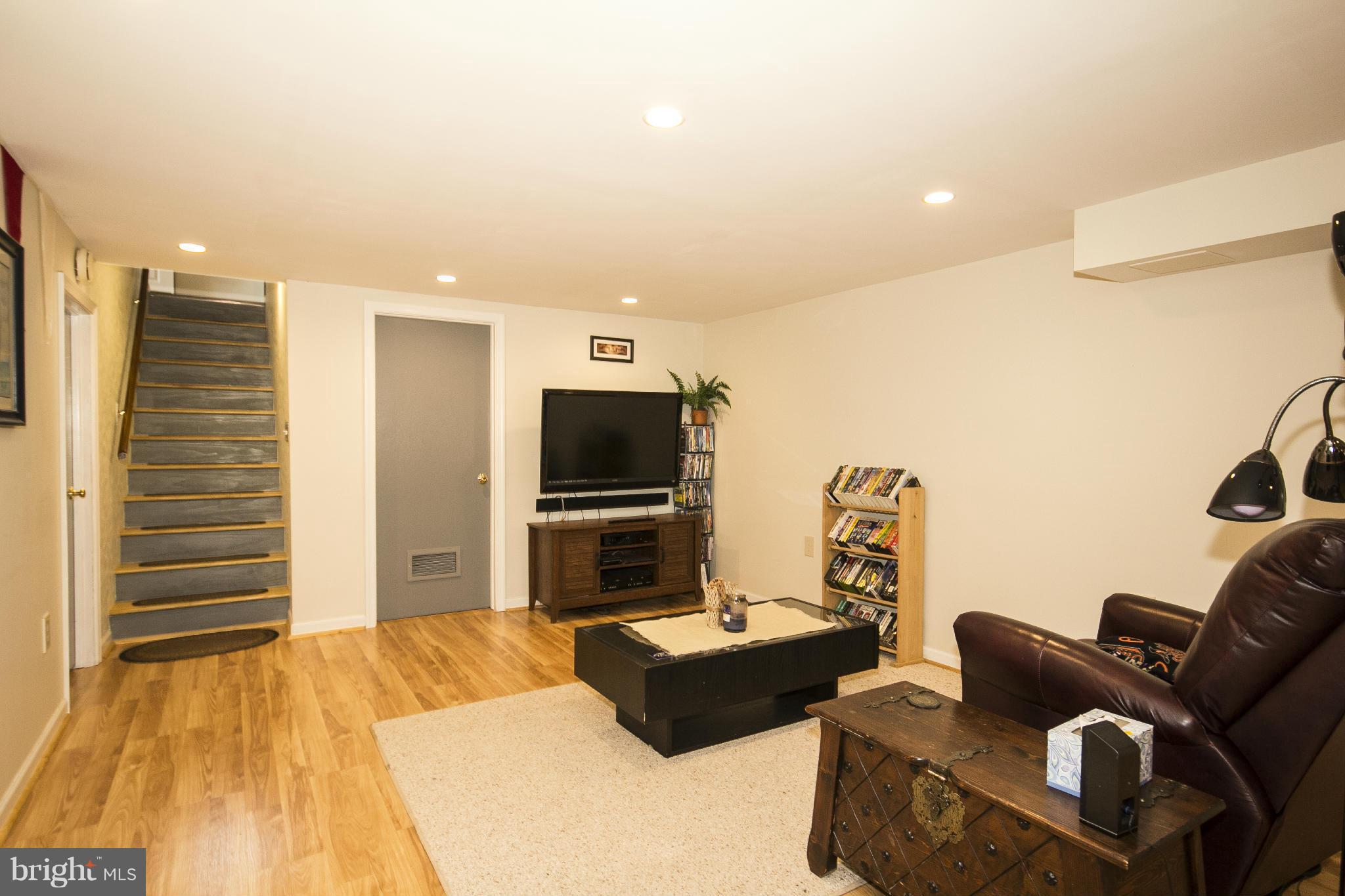 9810 Gunforge Road Perry Hall, MD 21128 - Photo 21 of 30 a living room with furniture and a flat screen tv