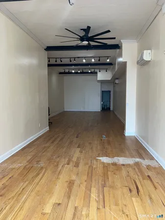 a view of a livingroom with an empty space