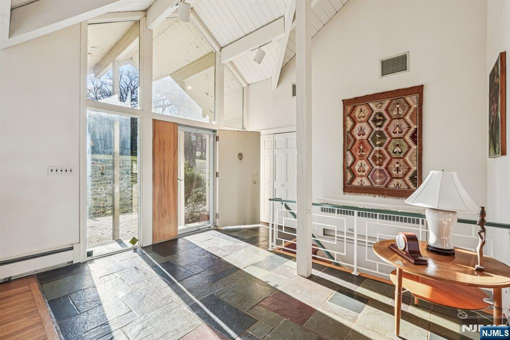 873 Olentangy Road Franklin Lakes, NJ 07417 - Photo 2 of 41 a bathroom with a sink and a mirror