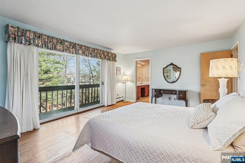 873 Olentangy Road Franklin Lakes, NJ 07417 - Photo 22 of 41 a bed room with a bed and a window