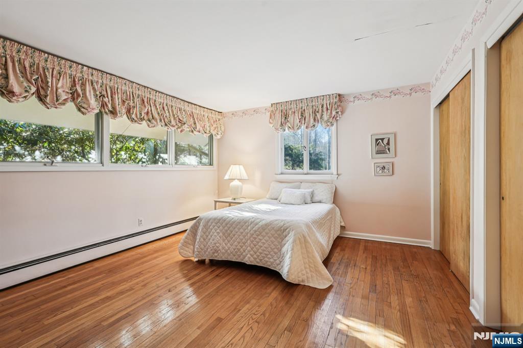 873 Olentangy Road Franklin Lakes, NJ 07417 - Photo 24 of 41 a bedroom with a bed and window
