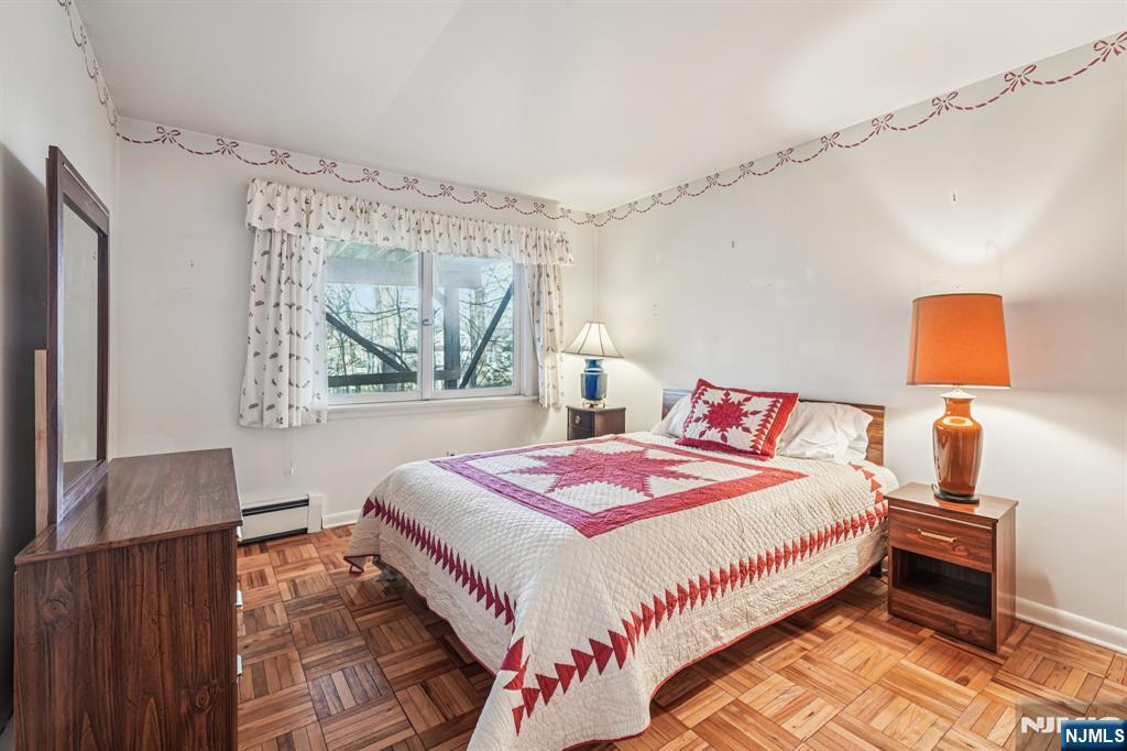 873 Olentangy Road Franklin Lakes, NJ 07417 - Photo 35 of 41 a bedroom with a bed and a window