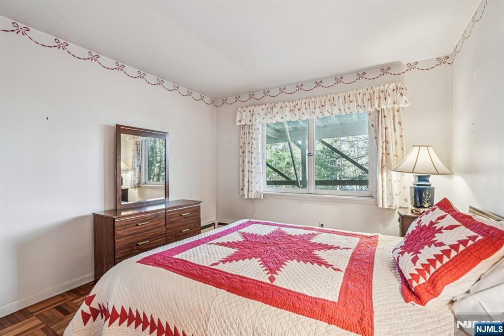 873 Olentangy Road Franklin Lakes, NJ 07417 - Photo 37 of 41 a bedroom with a bed and a window