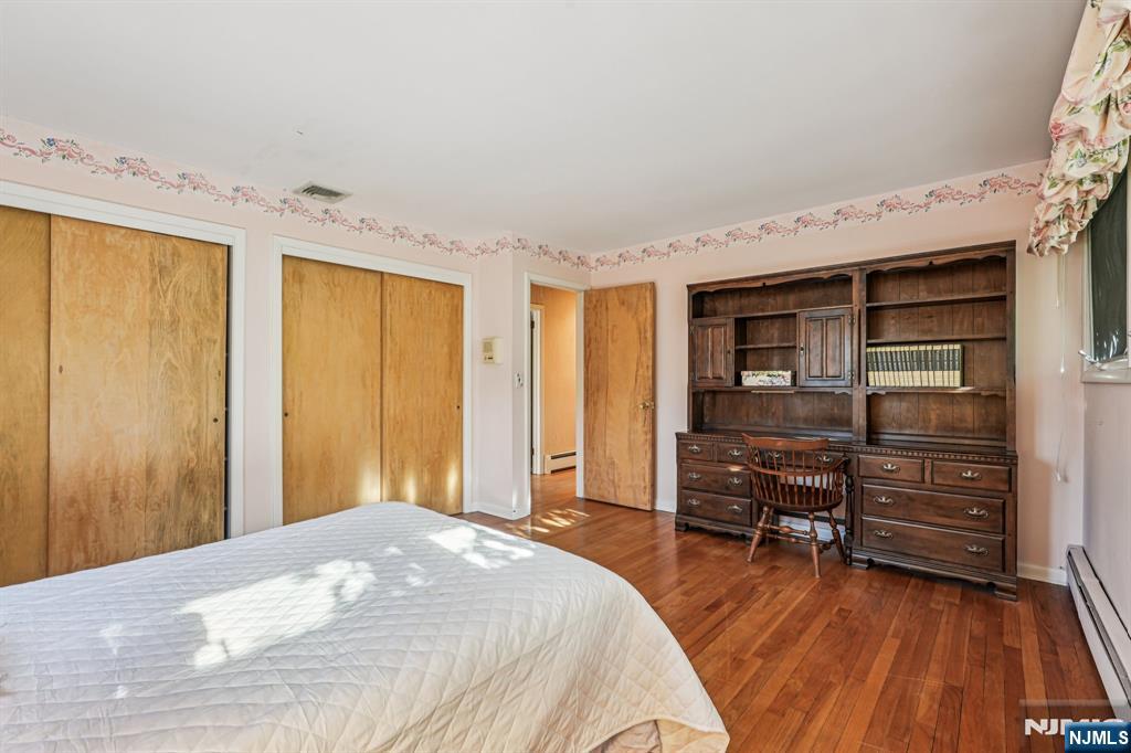 873 Olentangy Road Franklin Lakes, NJ 07417 - Photo 38 of 41 a bedroom with a bed and furniture