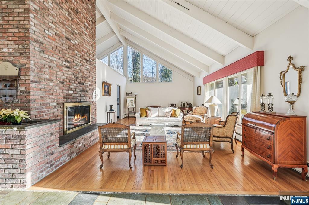 873 Olentangy Road Franklin Lakes, NJ 07417 - Photo 7 of 41 a view of a dining room with furniture window and wooden floor