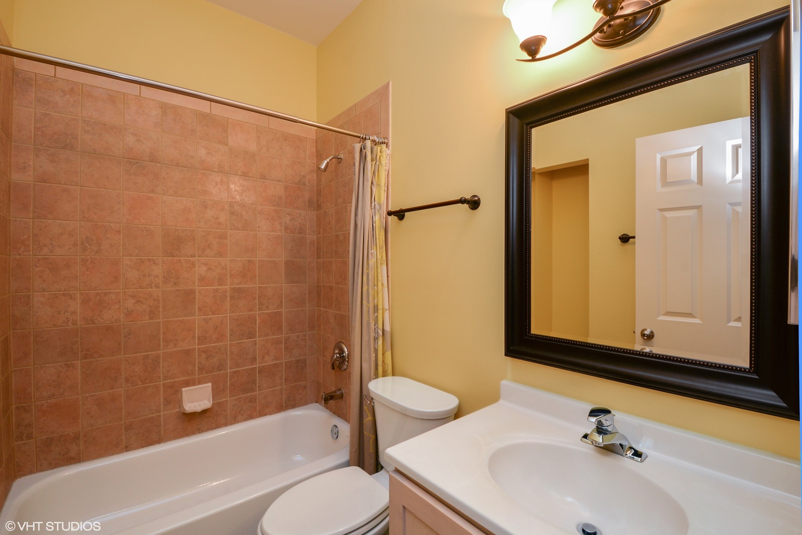 1437 West Fillmore Street Chicago, IL 60607 - Photo 13 of 23 a bathroom with a sink a toilet and shower