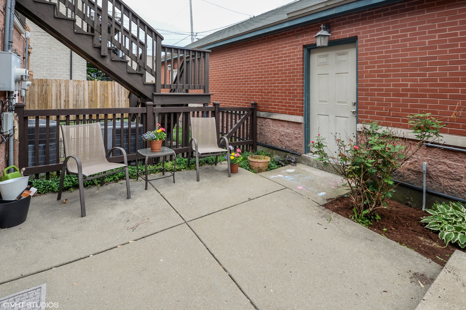 1437 West Fillmore Street Chicago, IL 60607 - Photo 14 of 23 a view of patio with chairs and potted plants
