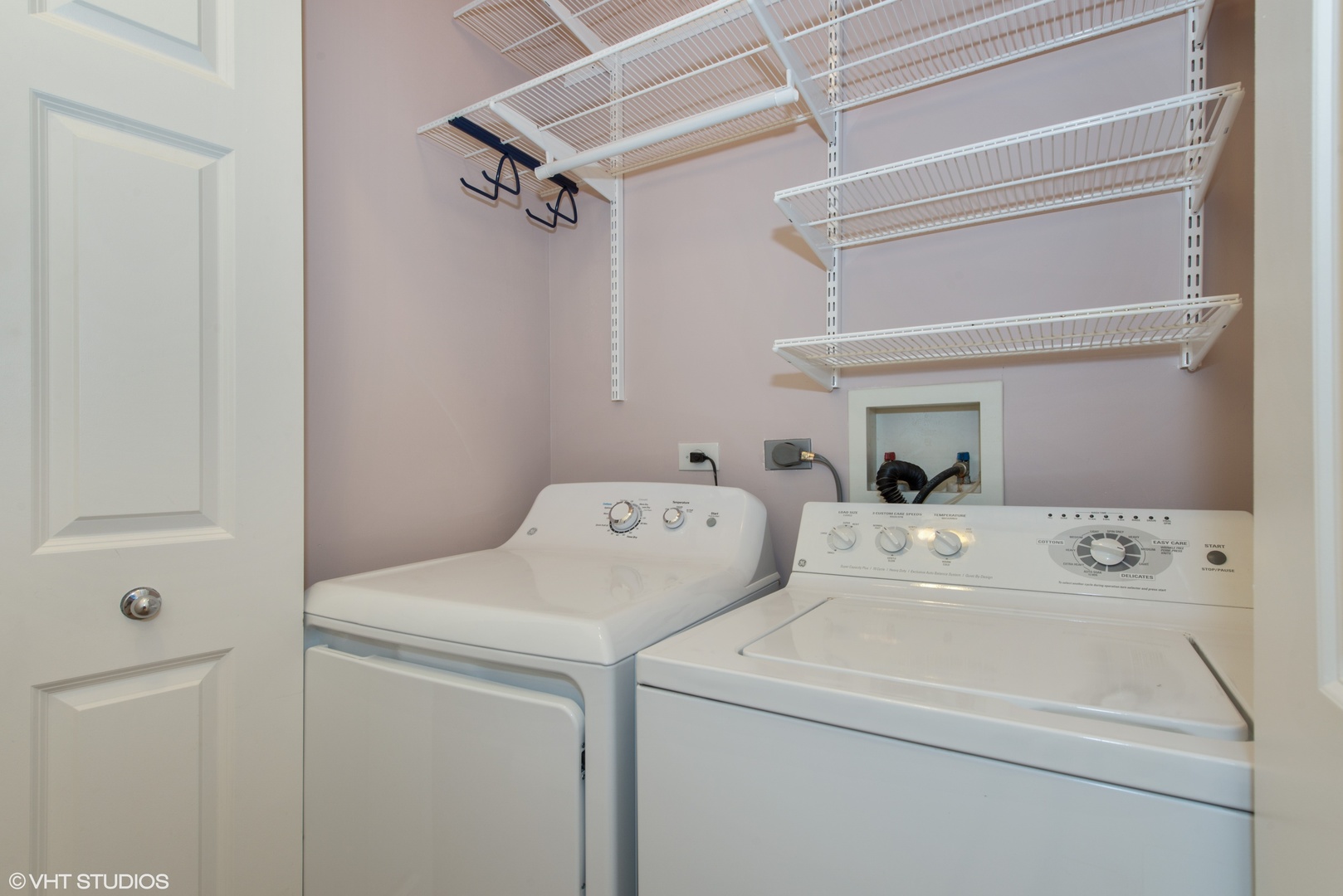 1437 West Fillmore Street Chicago, IL 60607 - Photo 23 of 23 a utility room with dryer and washer