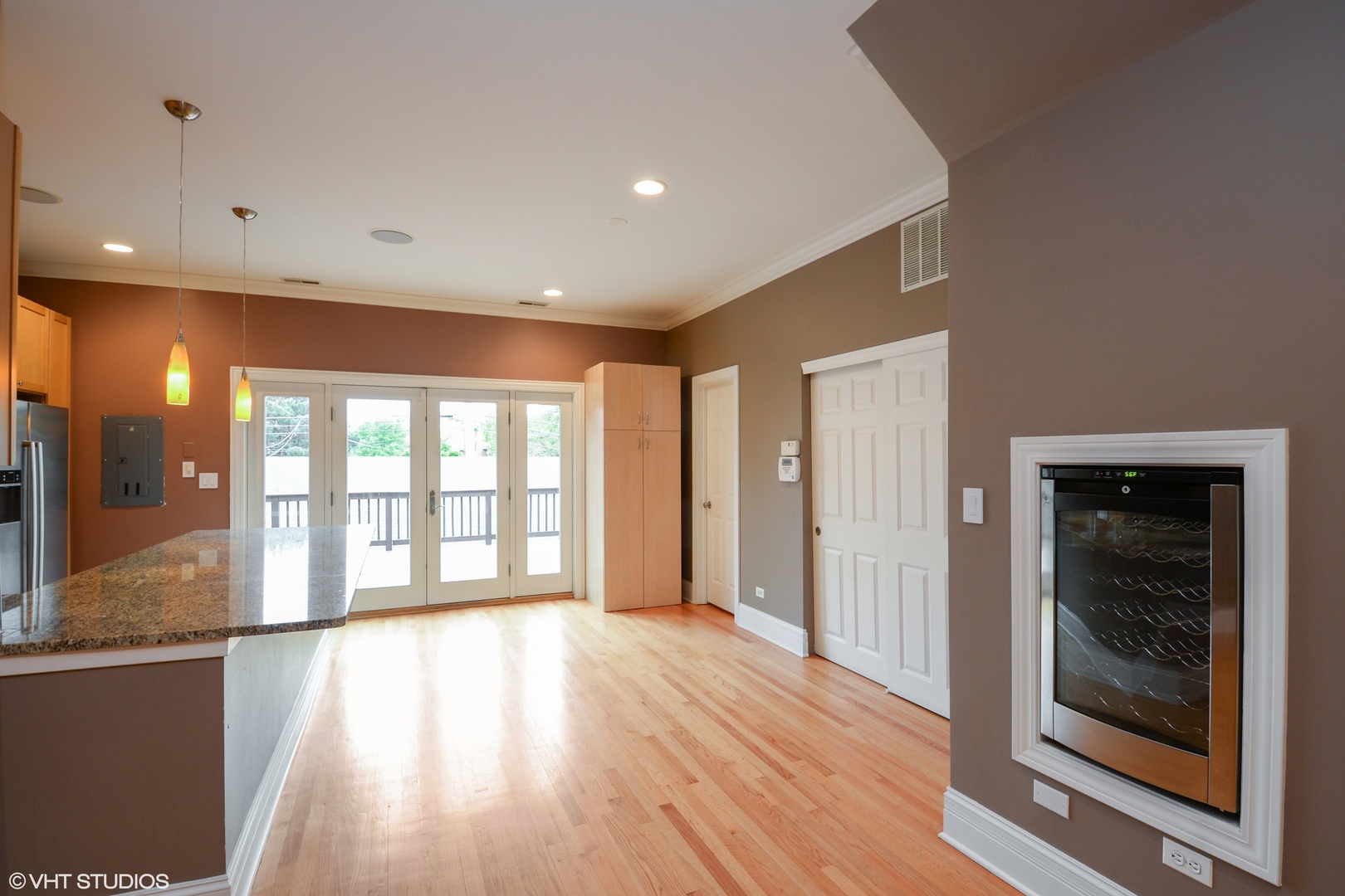 1437 West Fillmore Street Chicago, IL 60607 - Photo 4 of 23 a view of empty room with wooden floor and fan
