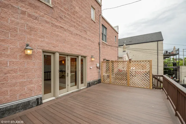 a view of a brick house with an empty room