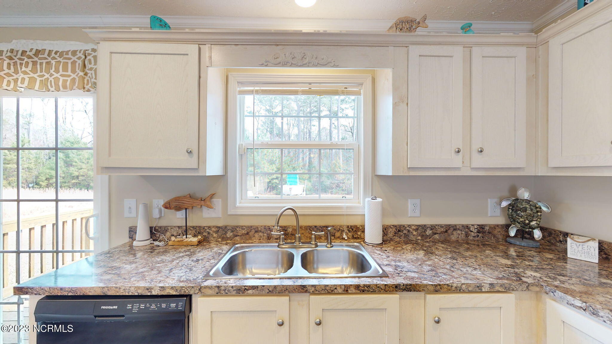 1019 Harkers Island Road Beaufort, NC 28516 - Photo 20 of 37 Kitchen View to Backyard
