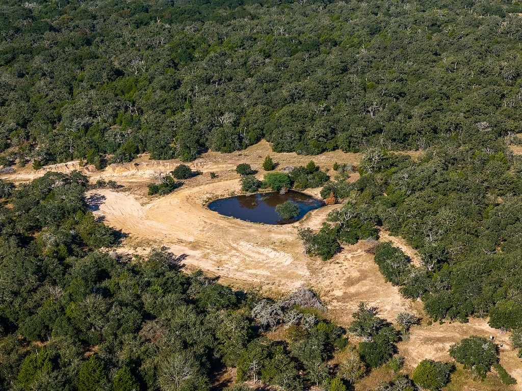 1883 County Road 273 Weimar, TX 78962 - Photo 11 of 25 a view of a backyard of the house