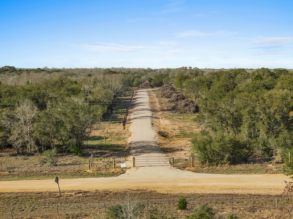 1883 County Road 273 Weimar, TX 78962 - Photo 23 of 25 a view of a yard with an outdoor space