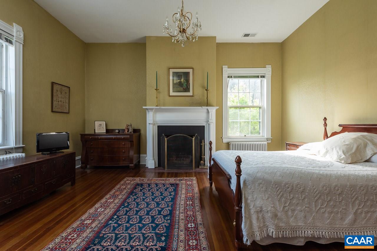 1521 Craigs Store Road Afton, VA 22920 - Photo 17 of 42 a bedroom with a bed and a couch