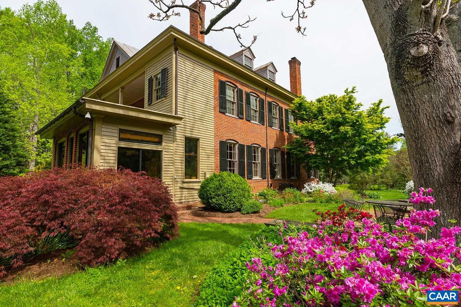 1521 Craigs Store Road Afton, VA 22920 - Photo 29 of 42 a front view of a house with a yard and fountain