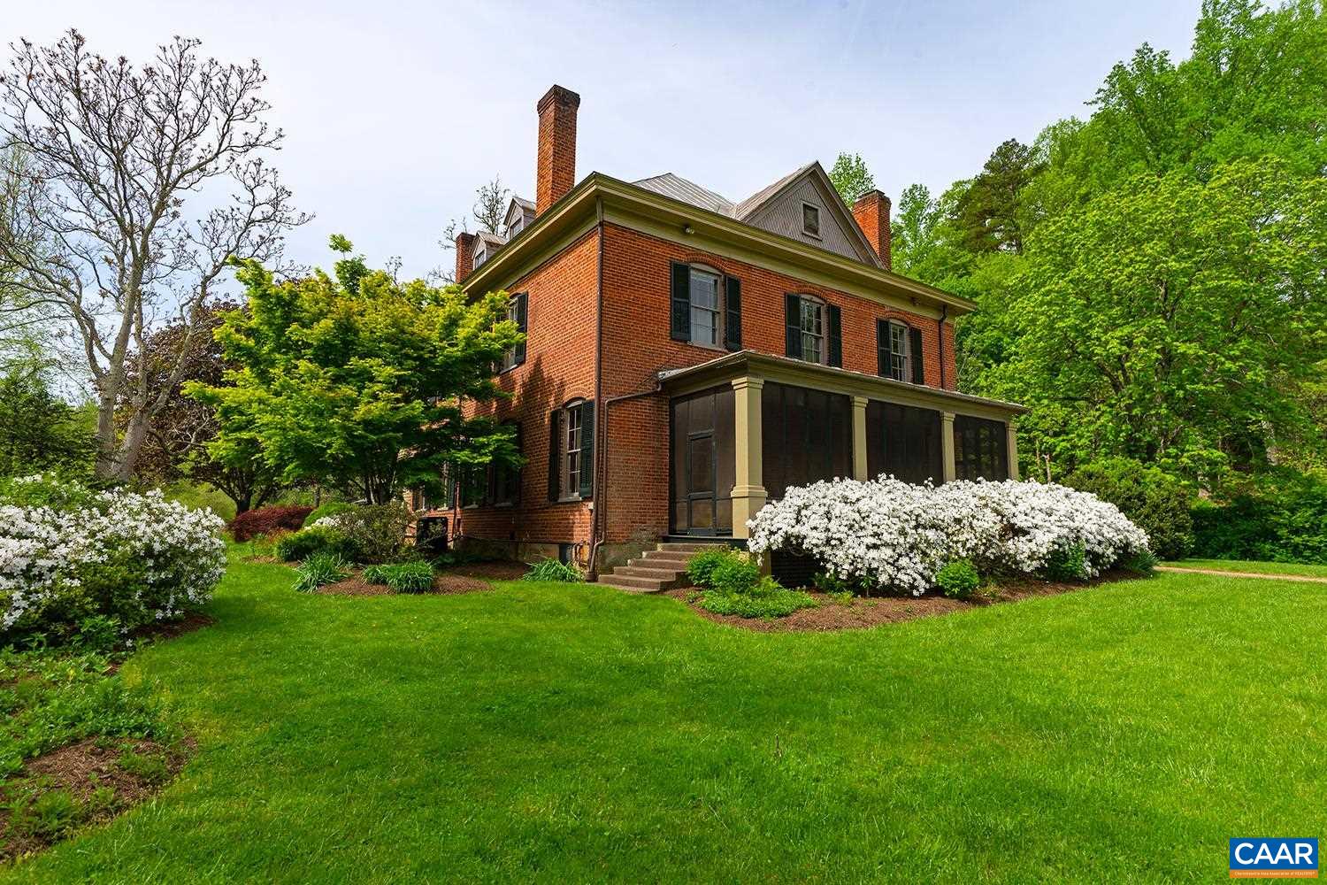 1521 Craigs Store Road Afton, VA 22920 - Photo 32 of 42 a front view of a house with a garden
