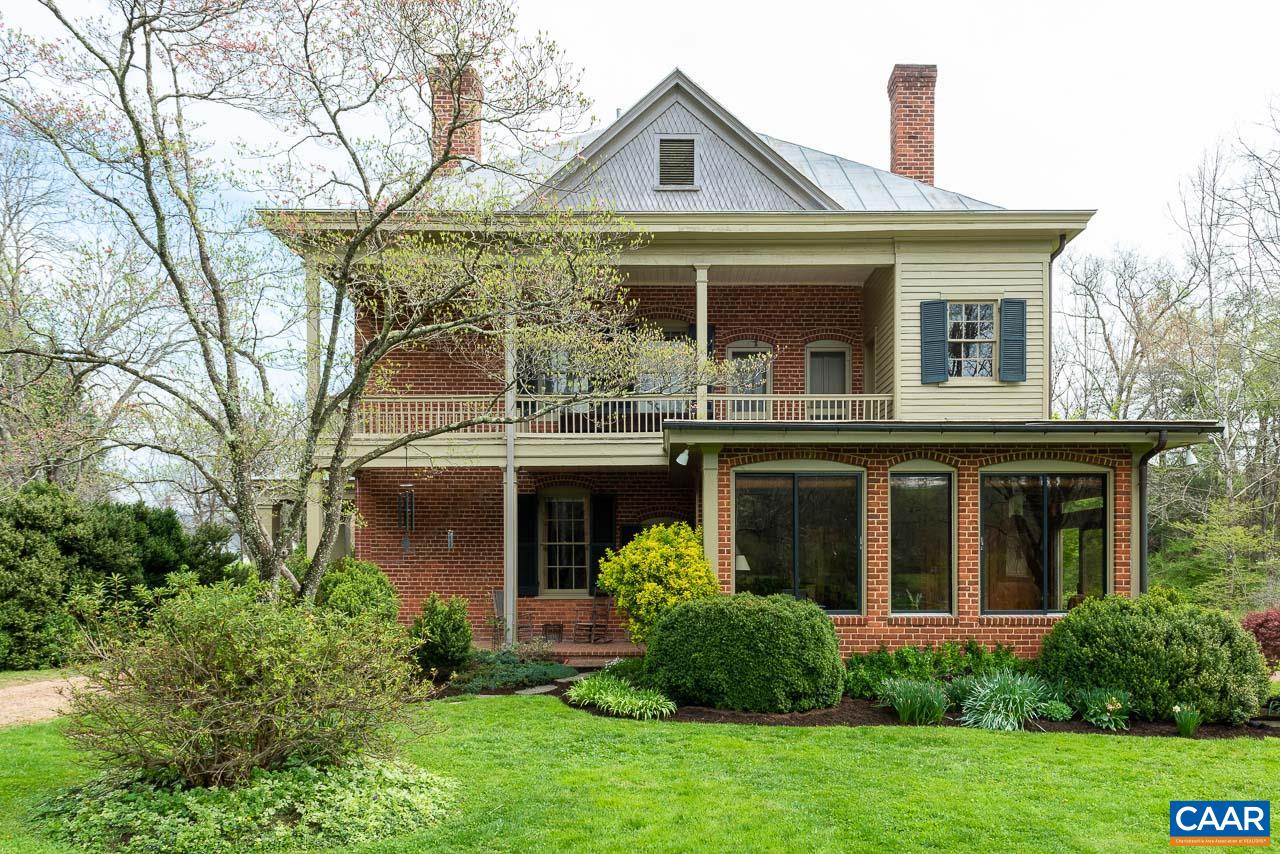 1521 Craigs Store Road Afton, VA 22920 - Photo 36 of 42 a front view of a house with a garden and plants