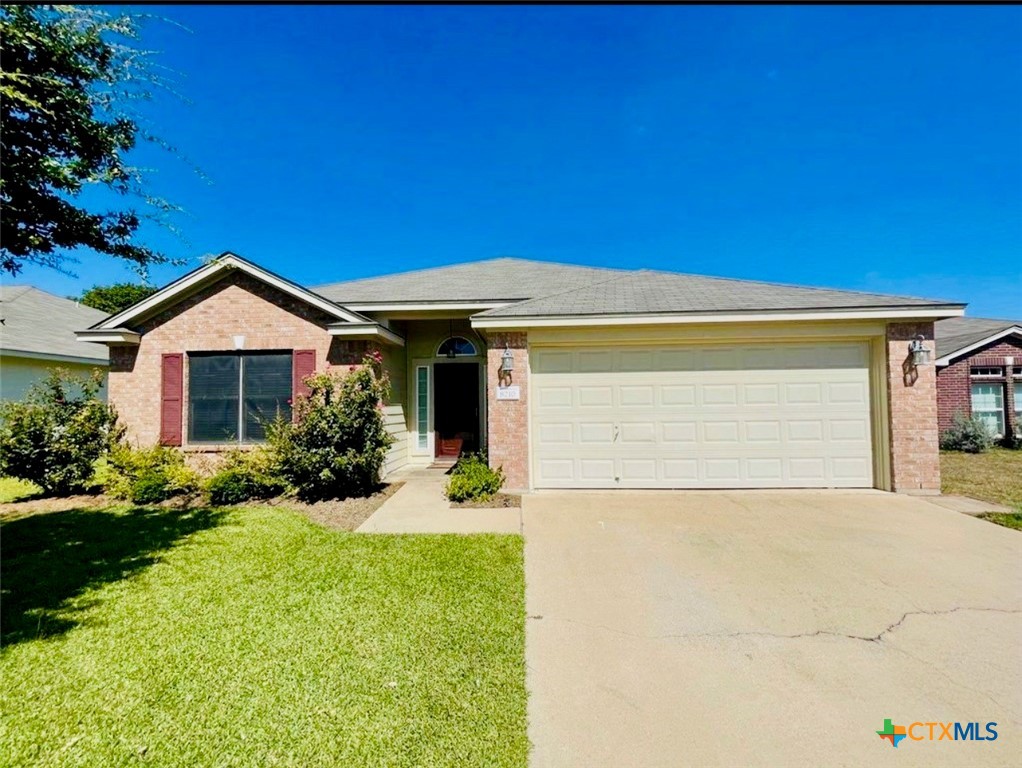 8210 Sunset Trail Temple, TX 76502 - Photo 1 of 15 a view of a house with backyard and garden