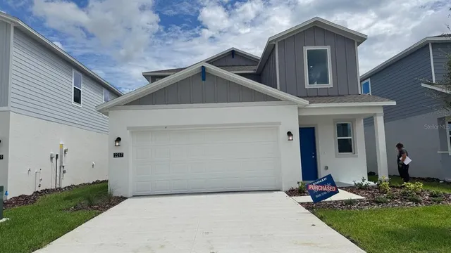 a front view of house with yard