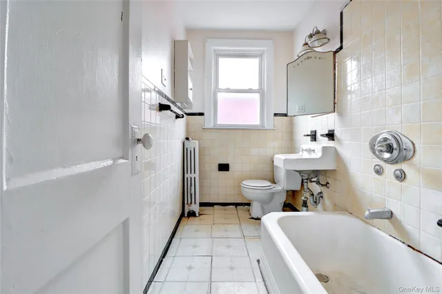 a view of an entryway with a chandelier