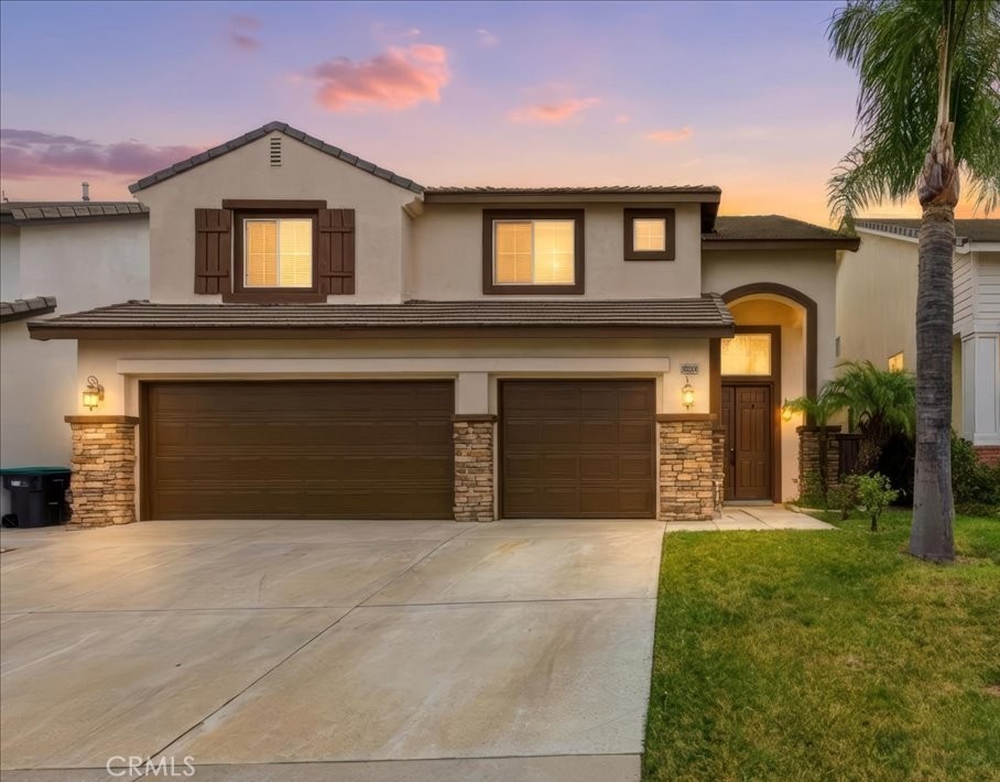 39264 Memory Drive Murrieta, CA 92563 - Photo 1 of 35 a front view of a house with a yard and garage