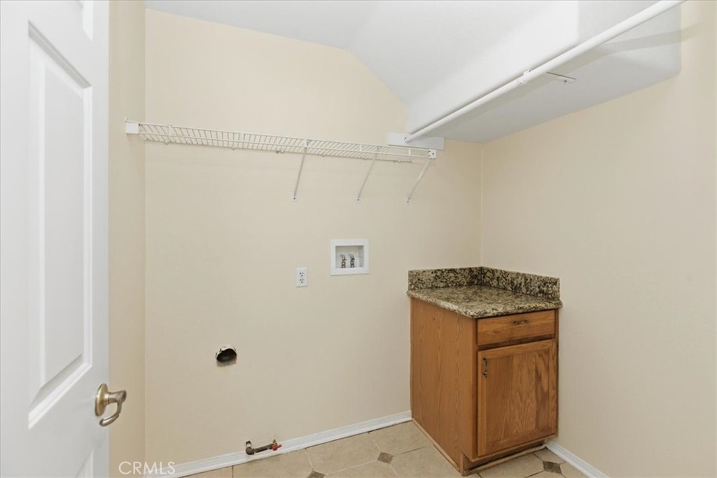 39264 Memory Drive Murrieta, CA 92563 - Photo 14 of 35 a utility room with dryer and washer